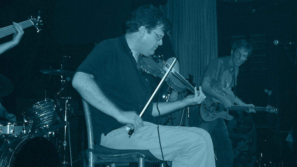 David Blackmon plays the fiddle